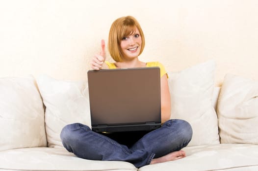 laughing woman with laptop
