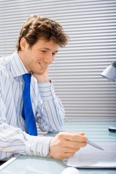Businessman reads document