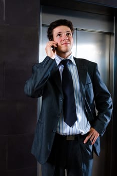 Businessman calling on phone