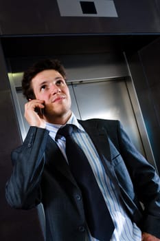 Businessman calling on phone