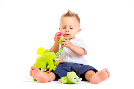 Baby plays with toys