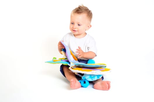 Baby plays with toys
