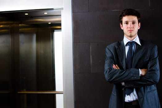 Portrait of satisfied businessman