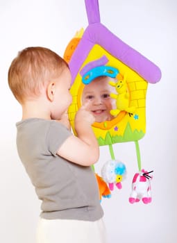 Baby plays with toys