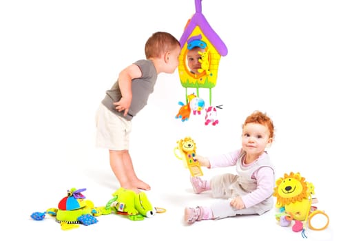 Babies play with toys