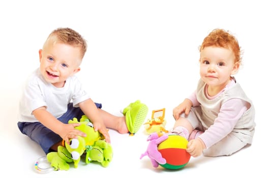 Babies play with toys
