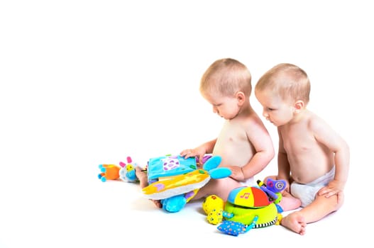 Baby twins playing