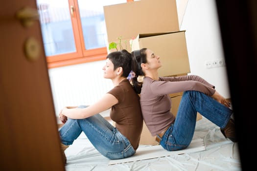Young women moving home