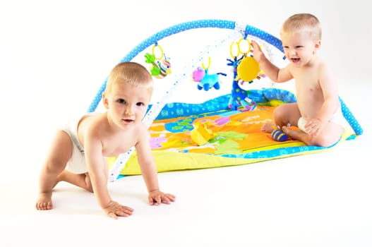 Baby twins playing