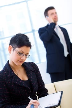 Businesspeople working at office