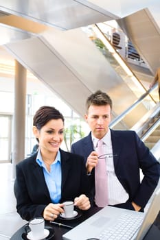 Business people in lobby