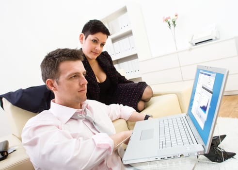 Businesspeople with laptop