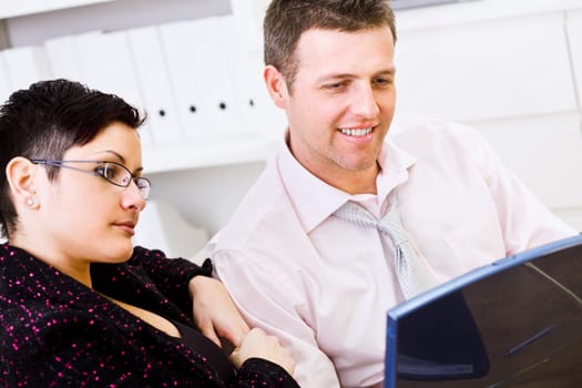 Happy businesspeople working together