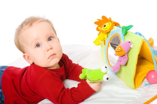 Baby boy playing with toys