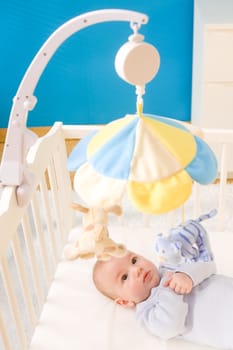 Little baby boy on crib