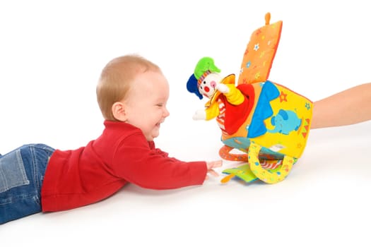 Baby boy playing with toys