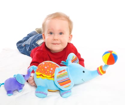 Baby boy playing with toys