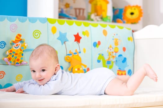 Happy baby on crib