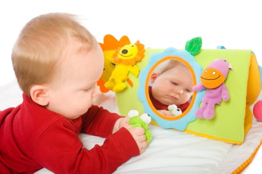 Baby boy playing with toys