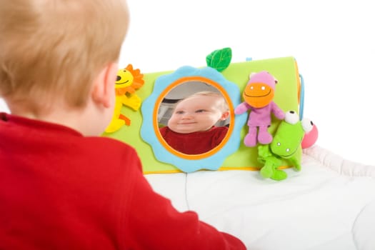 Baby boy playing with toys