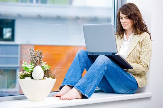 Businesswoman working on laptop
