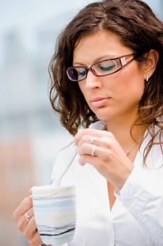 Business woman drinking coffee