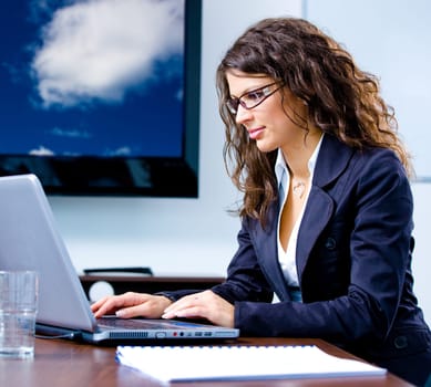 Businesswoman working on computer