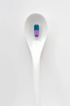 Capsule on spoon