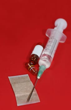 Disposable syringe with ampoule