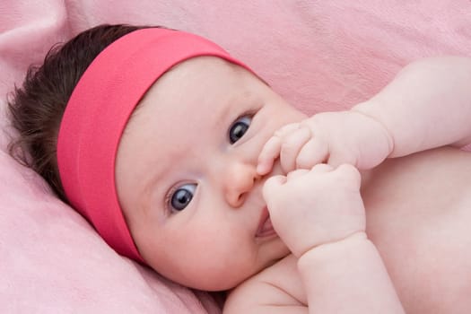 Adorable baby newborn with blue eyes