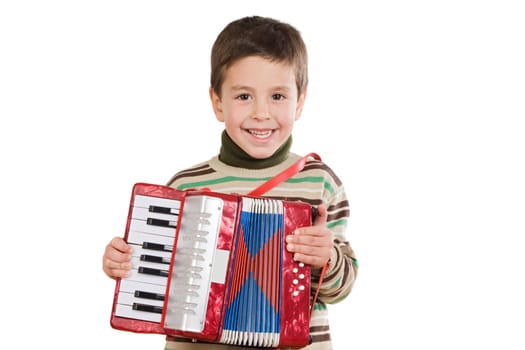 Adorable child playing red accordion