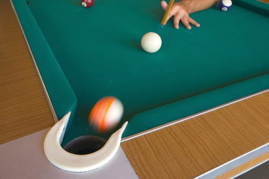 Playing billiards
