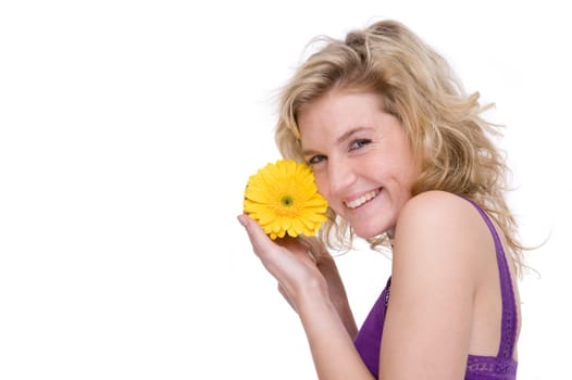 Young woman with a gerbera