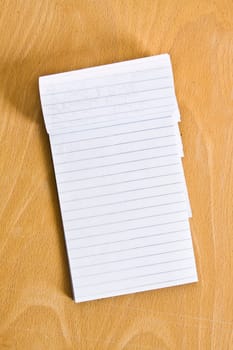 Notepad on wooden table