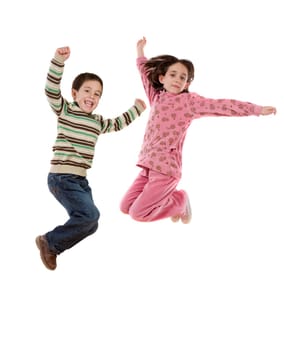 Two happy children jumping at once