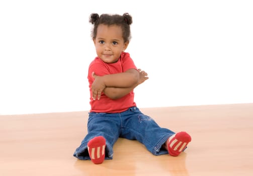 Adorable african baby sitting