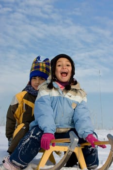 Kids on sleigh