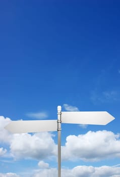 Signpost in blue sky