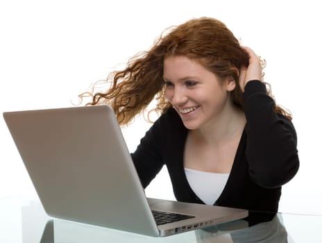 redhead teen with laptop