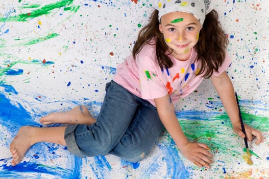 Girl playing with painting