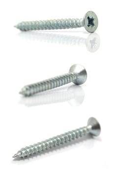 screws on white