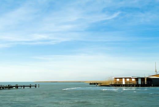 Lakeside Landscape with Boathouse