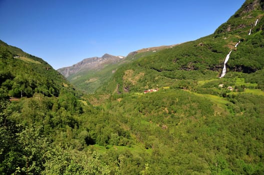 The Flåm Railway runs through this beautiful landscape in Norway. From Flåm on the Aurlandsfjord it goes in a dramatic ride up to Myrdal! The route is 20km long.