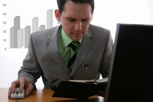 Businessman reading diary