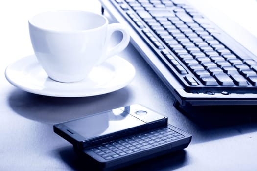 Keyboard, coffee cup and PDA  - high key