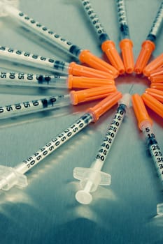 Many medical syringes