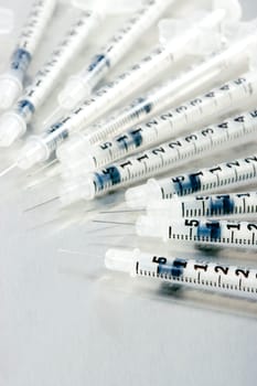 Many medical syringes