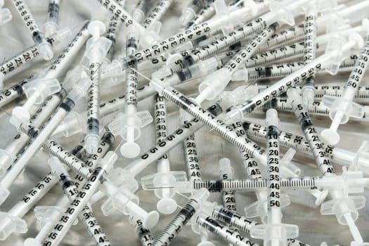 Many medical syringes