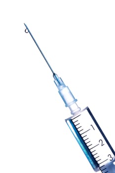 Drop of a liquid on a needle of syringe