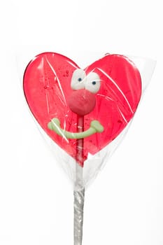 Candy red heart isolated over white